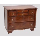 A c.1900 Continental serpentine chest of drawers