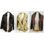 A blond mink three quarter fur jacket with turned up cuffs and shawl collar containing label for