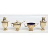 A matched four piece hallmarked silver cruet set, comprising a pair of peppers, Walker & Hall,