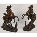 After COUSTOU; a pair of large bronze Marly horses, height 49cm.