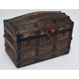 An early 20th century leather, oak and metal banded coffer with domed hinged lid, 80 x 46cm,