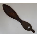 A carved wooden scoop, probably South Sea Islands, length 25cm.