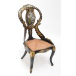 A 19th century papier mâché cane seated chair with mother of pearl inlay,