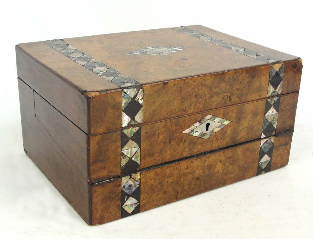 A Victorian walnut veneered and mahogany writing slope with two decorative mother of pearl inlaid