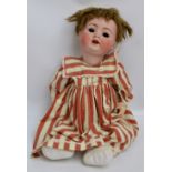 A large early 20th century German bisque headed doll with open/close eyes (af) and open mouth