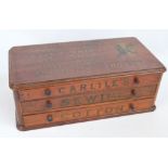 An unusual late 19th century mahogany cotton reel cabinet of three drawers,