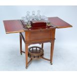 An Edwardian mahogany surprise drinks cabinet,