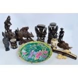 A 20th century Japanese charger, diameter 37cm, a quantity of decorative wooden carvings,