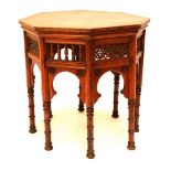 A late 19th century mahogany Moorish style octagonal occasional table with carved geometrical and