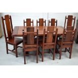 A Rhodesian teak rectangular dining table on slab supports,