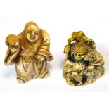 A Japanese Meiji period carved ivory netsuke modelled as a seated gentleman holding a staff before