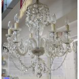 A six branch cut glass chandelier, height approx 75cm.