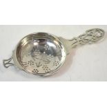 A George VI hallmarked silver tea strainer with Celtic design, Sheffield 1943. approx 1.1ozt.