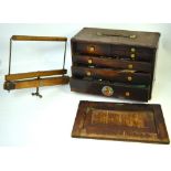 A vintage toolbox containing a quantity of tools and a Watt's kit bag stretcher (2).