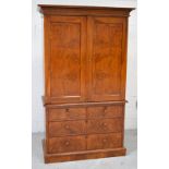 A walnut linen press,