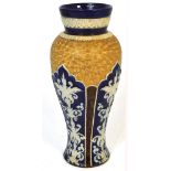 A late 19th century Doulton Lambeth baluster vase in the Secessionist style and gilt heightened,