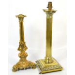 Two brass table lamps, one with fluted column style support, height of largest 52cm (2).