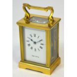 A Mappin & Webb carriage clock, the enamel dial set with Roman numerals, height 11cm.