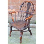 A 19th century child's Windsor chair.