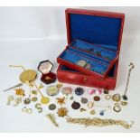 A quantity of costume jewellery to include various brooches, necklaces and pendants etc.