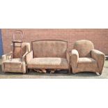 A 1920s upholstered three piece suite comprising mahogany framed sofa,