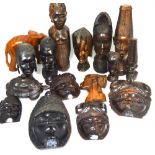 A quantity of mid 20th century Nigerian hardwood carvings and masks.