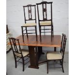 A c1940s dropleaf table and four mahogany Edwardian inlaid dining chairs on turned legs (5).