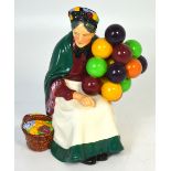 A Royal Doulton figurine HN1315 'The Old Balloon Seller'.