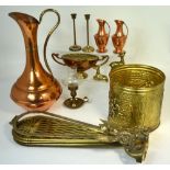 A quantity of brass and copper ware to include a large copper jug, a brass bin,