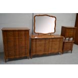 An American four piece bedroom suite comprising a tall four drawer chest of drawers, width 85cm,