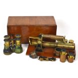 A Smith & Beck of London mahogany cased brass microscope with various eye pieces and objective
