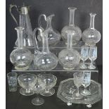A quantity of glassware to include a 19th century glass and silver plated claret jug with etched