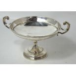 A silver plated Walker & Hall twin handled bowl raised on stepped rounded base.