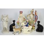 A small quantity of 19th century decorative ceramics to include Staffordshire flatbacks one