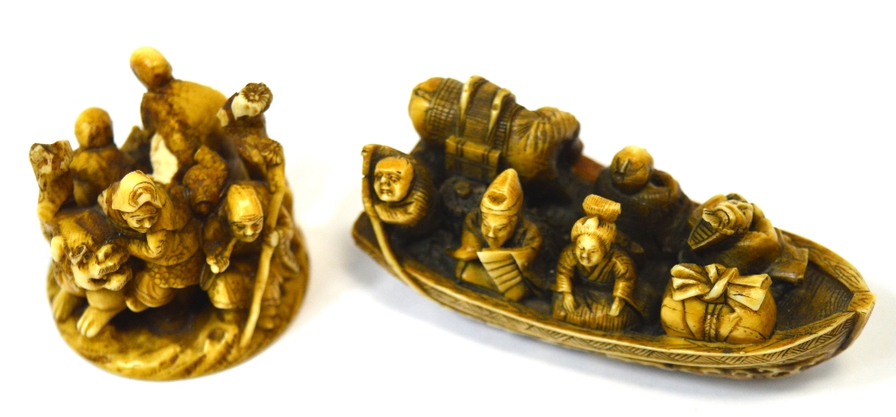 A Japanese Meiji period carved and stained netsuke modelled as five figures,