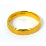 A 22ct gold wedding band, size H/I, approx 2.9g.