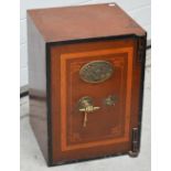 A Victorian cast iron safe, complete with key, width 40cm.