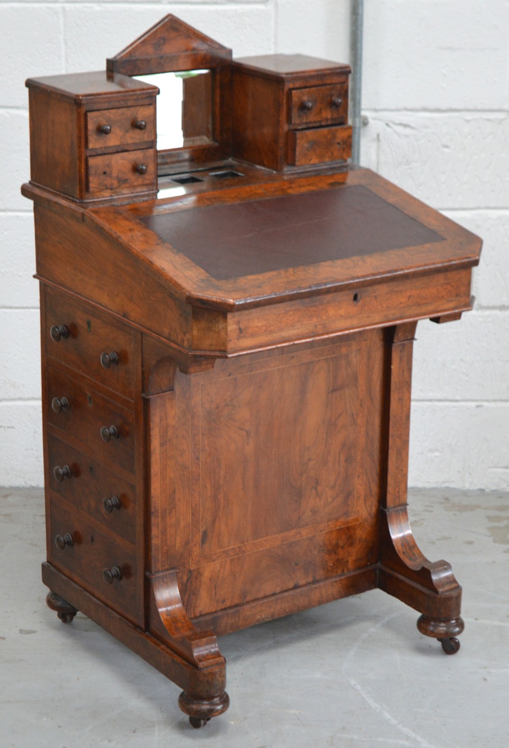 A 19th century burr walnut Davenport,