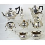 A quantity of silver plated items to include a four piece Walker and Hall tea service etc.