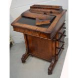 A Victorian walnut Davenport desk with satinwood inlay,