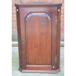 A 19th century mahogany single door corner cupboard, height 93cm.