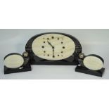 An Art Deco style clock garniture,