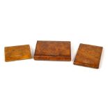 Three 20th century Siberian birch cigarette cases/boxes, the largest 10 x 12cm (3).