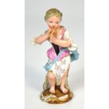 A late 19th century Meissen porcelain figure of a young woman playing a piccolo,