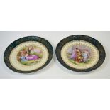 A pair of Royal Vienna style wall plaques, diameter 25cm.