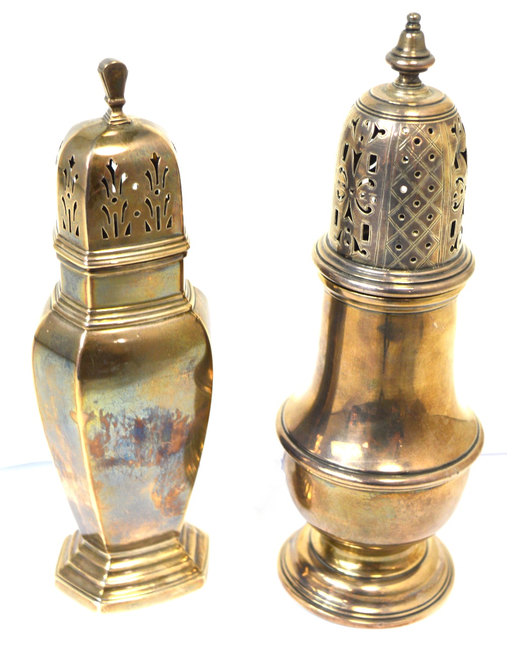 A George VI hallmarked silver baluster sugar caster with pierced domed cover and spreading circular