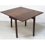 A George III mahogany dropleaf rectangular dining table of small proportions raised on square