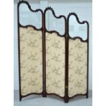 A large early 20th century mahogany framed three-section two-fold screen,