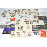 A quantity of stamps, mainly first day covers and a small collection of commemorative coins.