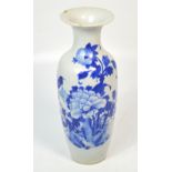 A c1900 blue and white Chinese vase with peony and bird decoration and bearing 17th century style